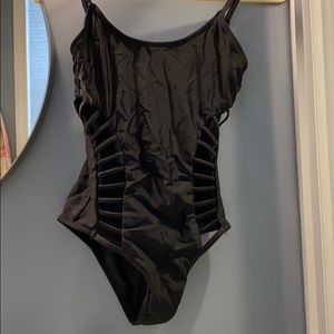 Black one piece swim suit with cage details